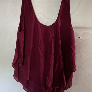 Free people intimately top size small. Runs large ! I would say at least a m/L.